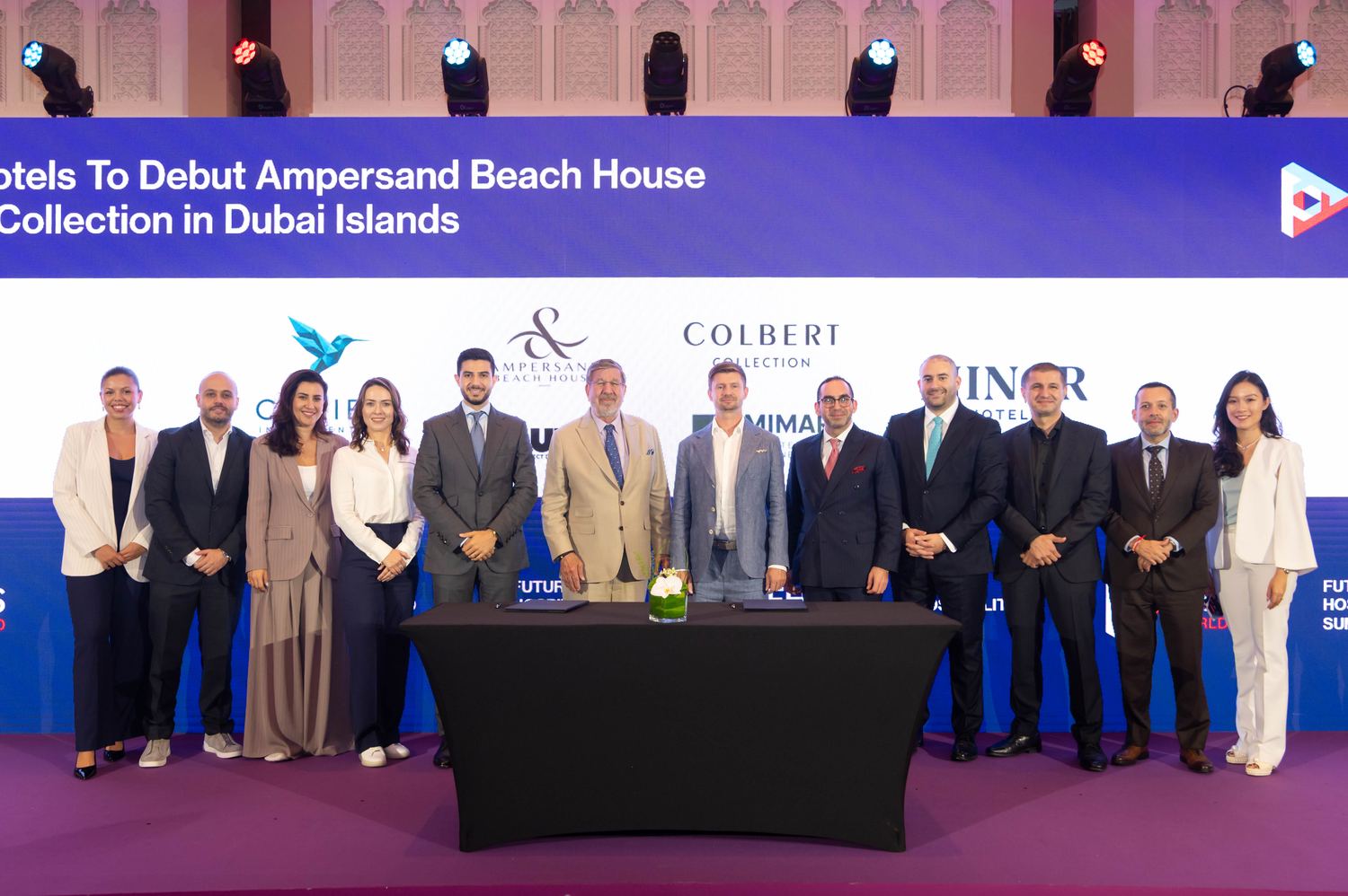 The project team on stage after the signing