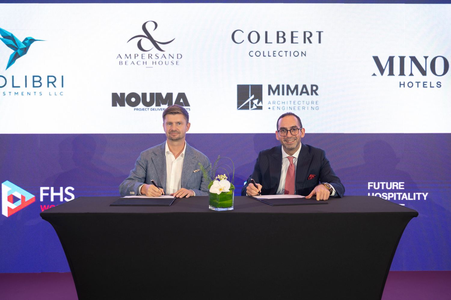 The signing, Minor Hotels and Colibri Investments, with the NOUMA mark on the backdrop